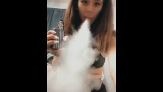 Vaping in bra and leggings